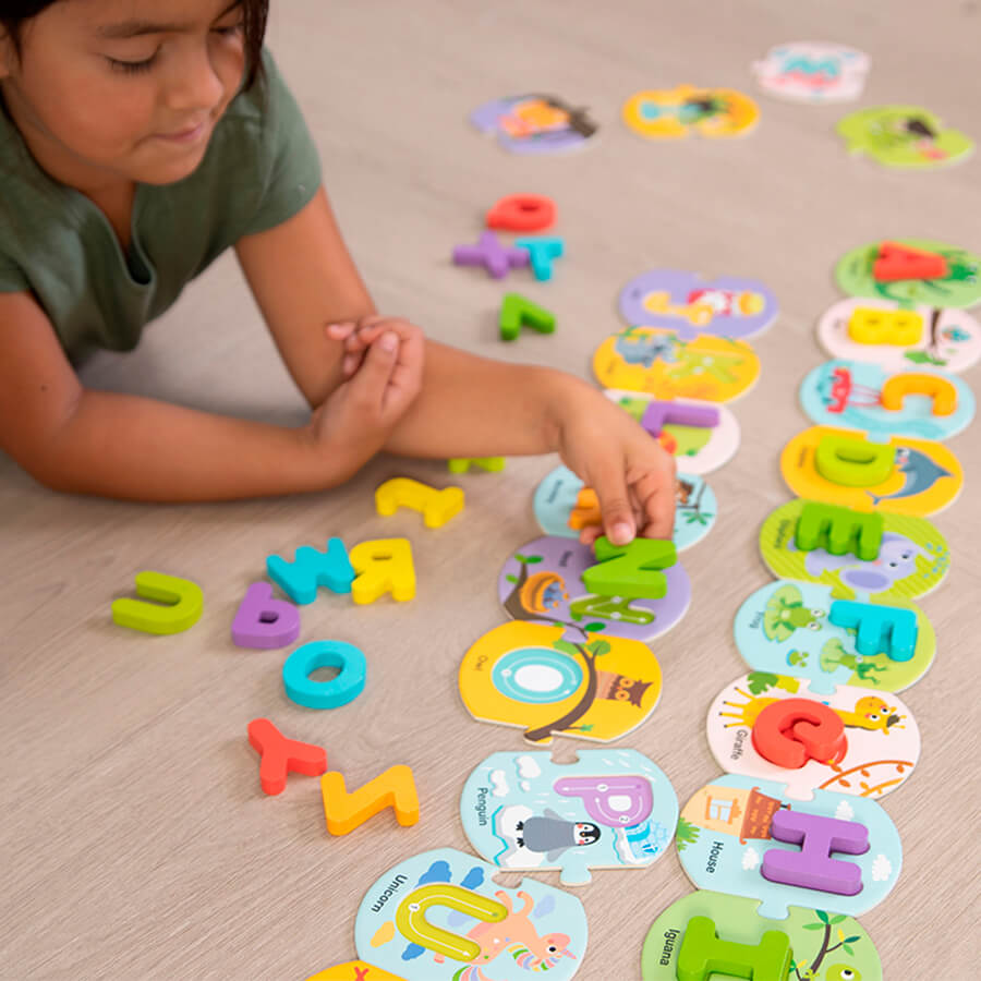 Image of child having fun playing with Match & Learn Lettes & Numbers