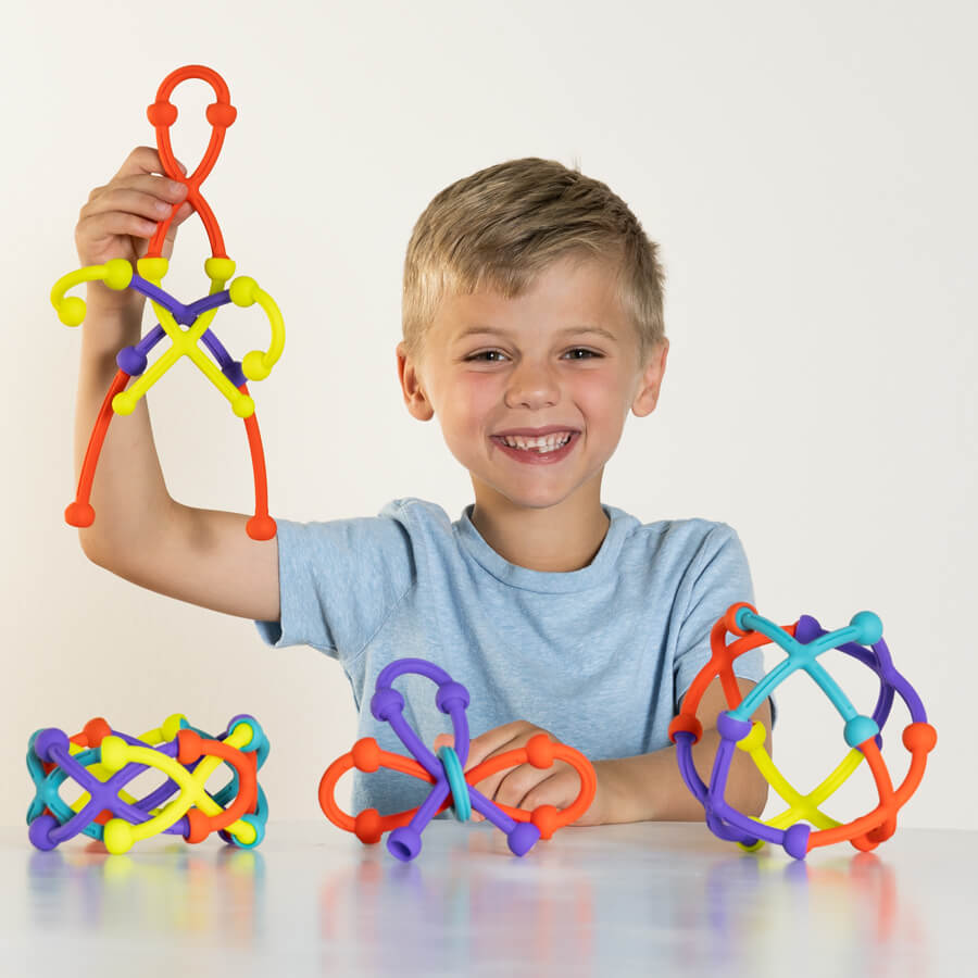 Image of a child having fun playing with Plip Kit