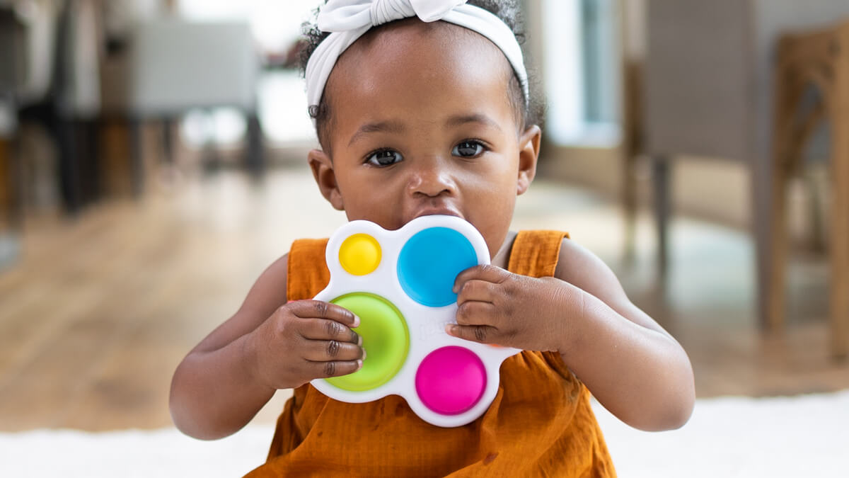 Child having fun playing with Dimpl!